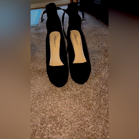 High platform heels, worn once. If u have strong ankles these shoes are for you. - Picture 1 of 3